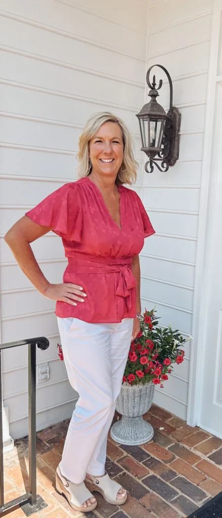 A counselor on the front porch of the office