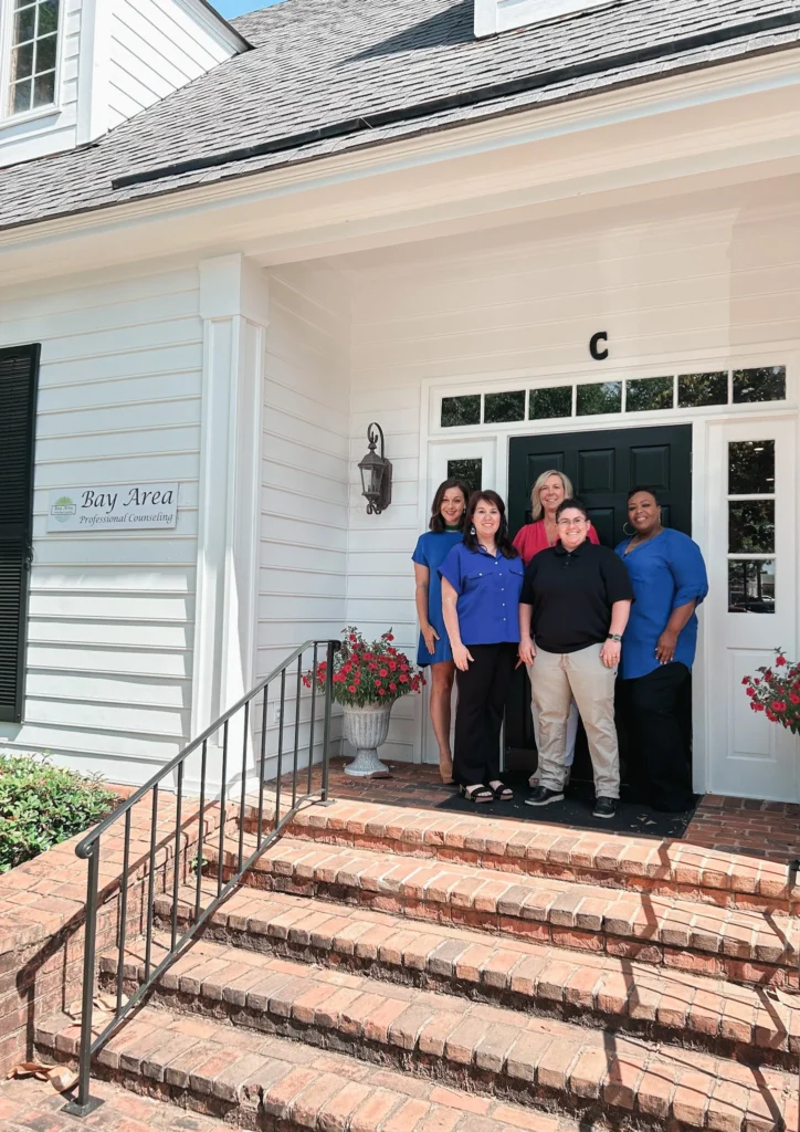 Bay Area Professional Counseling team at the entrance of the office on Airport Boulevard, Mobile, AL